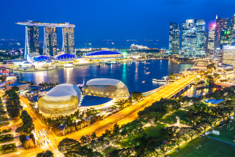 Beautiful architecture building exterior of singapore city skyline at twilight and night time