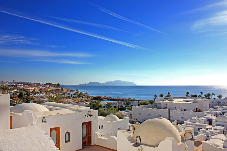 White city and blue sea panoramic view. Sharm al-Sheikh coastline, Egypt. Travel and vacation concepts.