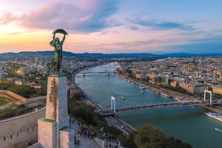 Budapest cityscapes form Gellert Hill. Amazing sunset in the background. Included the Danube river, historical bridges, Budapest dwontown, Gellrt square, Gellert hotel, Gellert thermal bath,Gellert Square and Liberty bridge